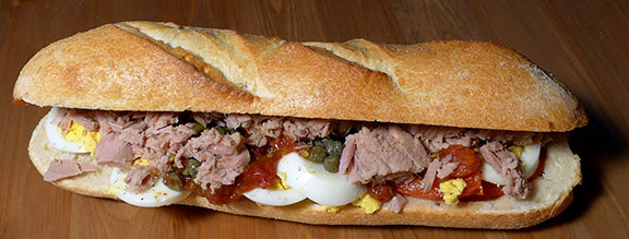 Casse Croûte Tunisien: Tunisian Hero with Tuna, Eggs, Pickled Peppers and Hot Pepper Sauce